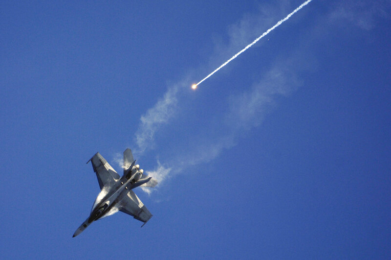 Jet fighter launching missile