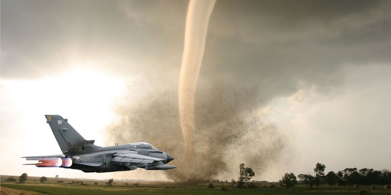 Jet fighter near a tornado