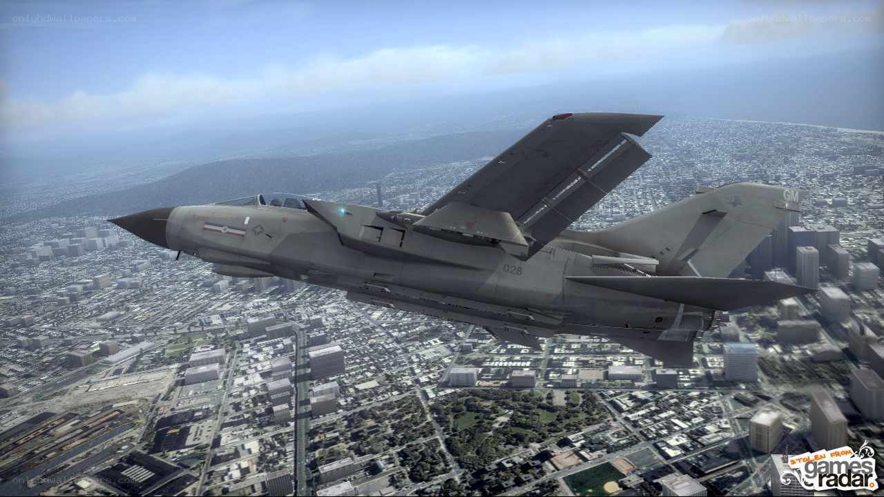 jet fighter over city