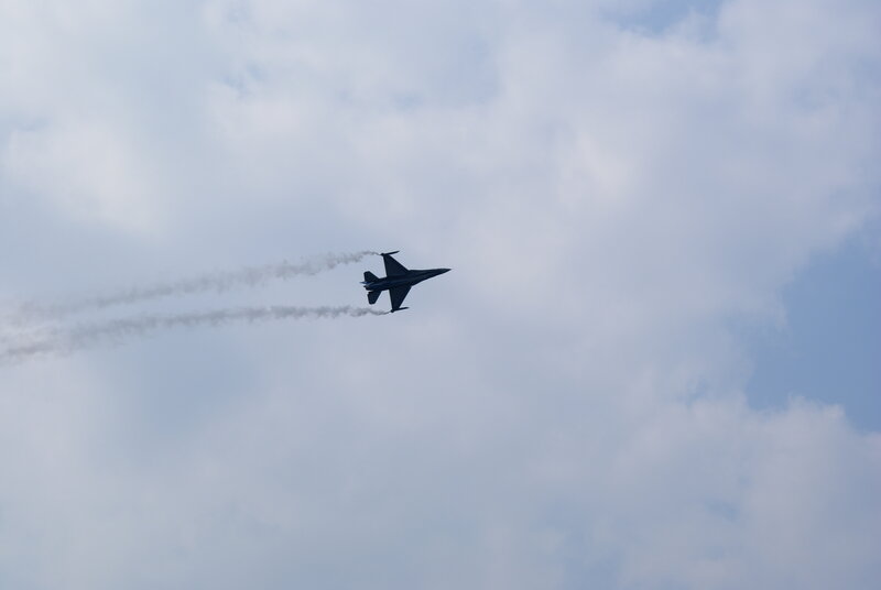 Jet fighter performing aerobatic display