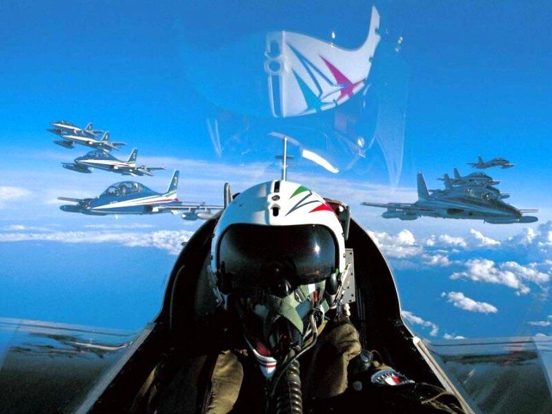 Jet fighter pilot in formation