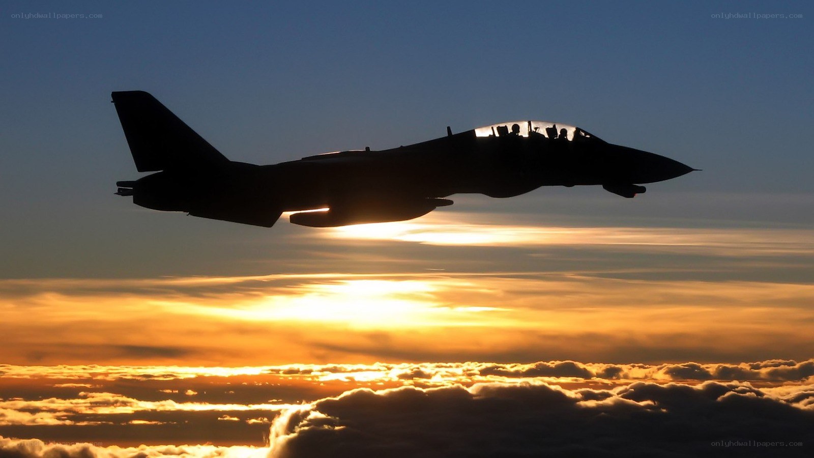 jet fighter silhouette at sunset