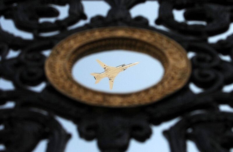 Jet fighter through ornate frame