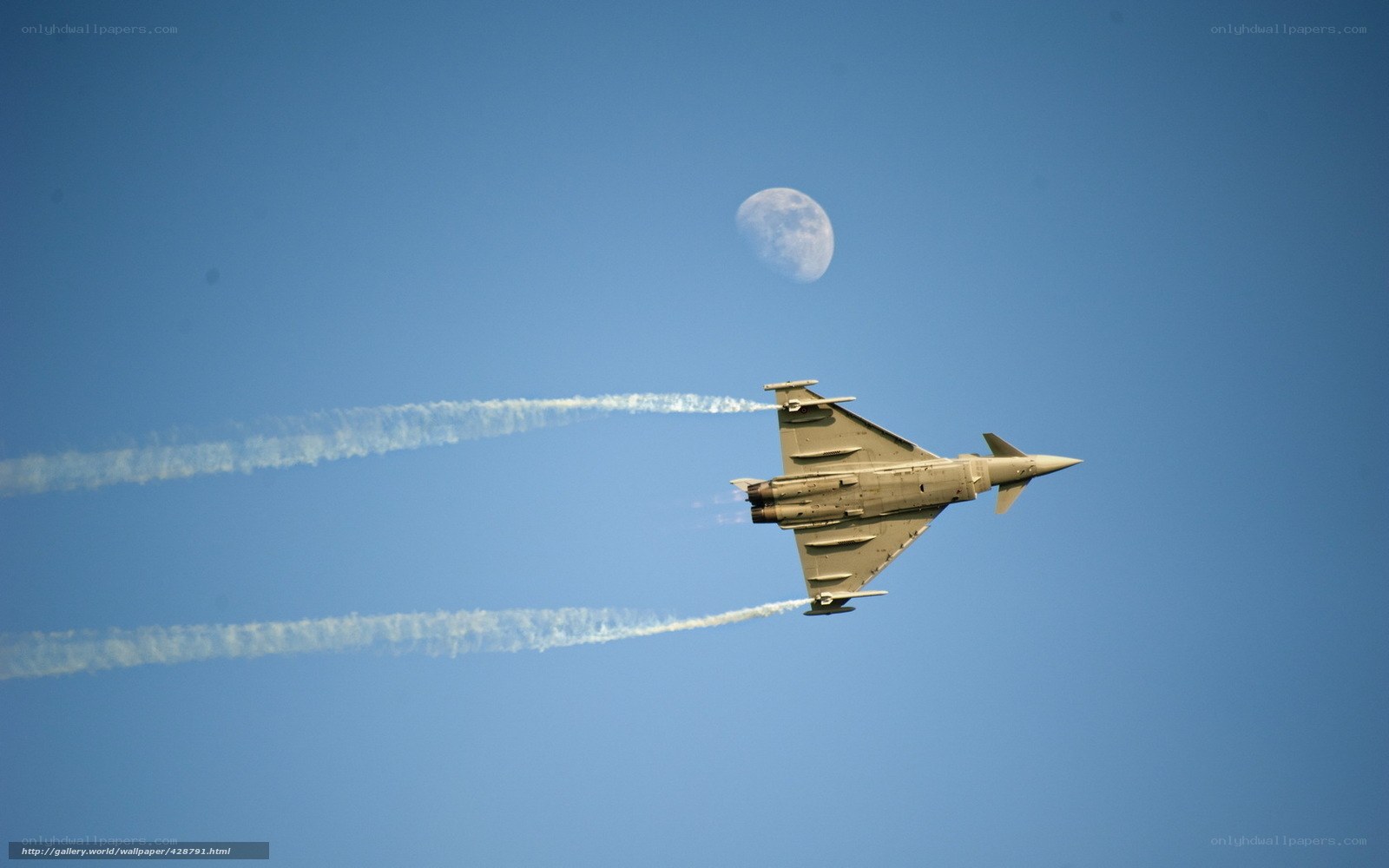 Jet fighter with moon in background