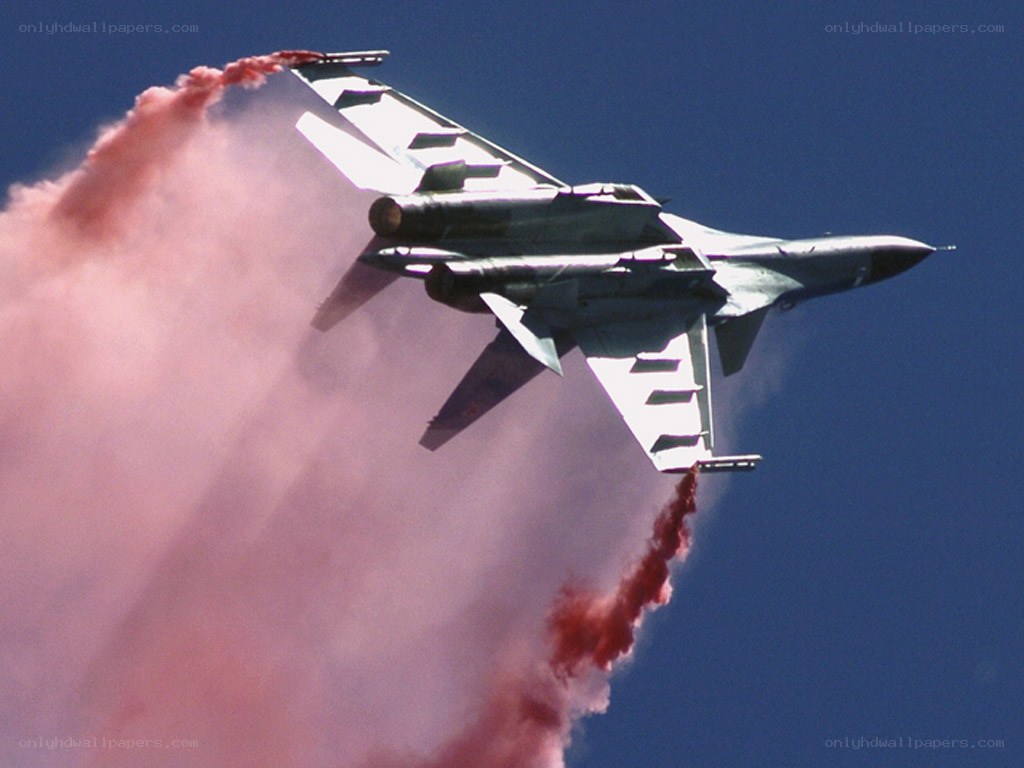 Jet fighter with smoke trails