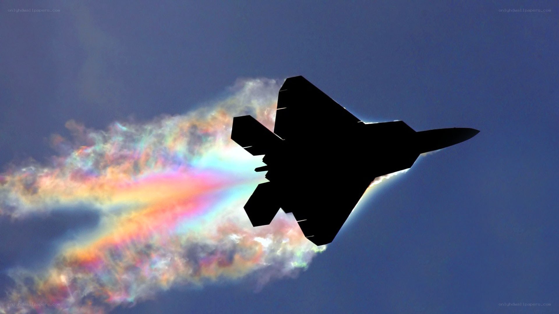 Jet fighter with vapor trail