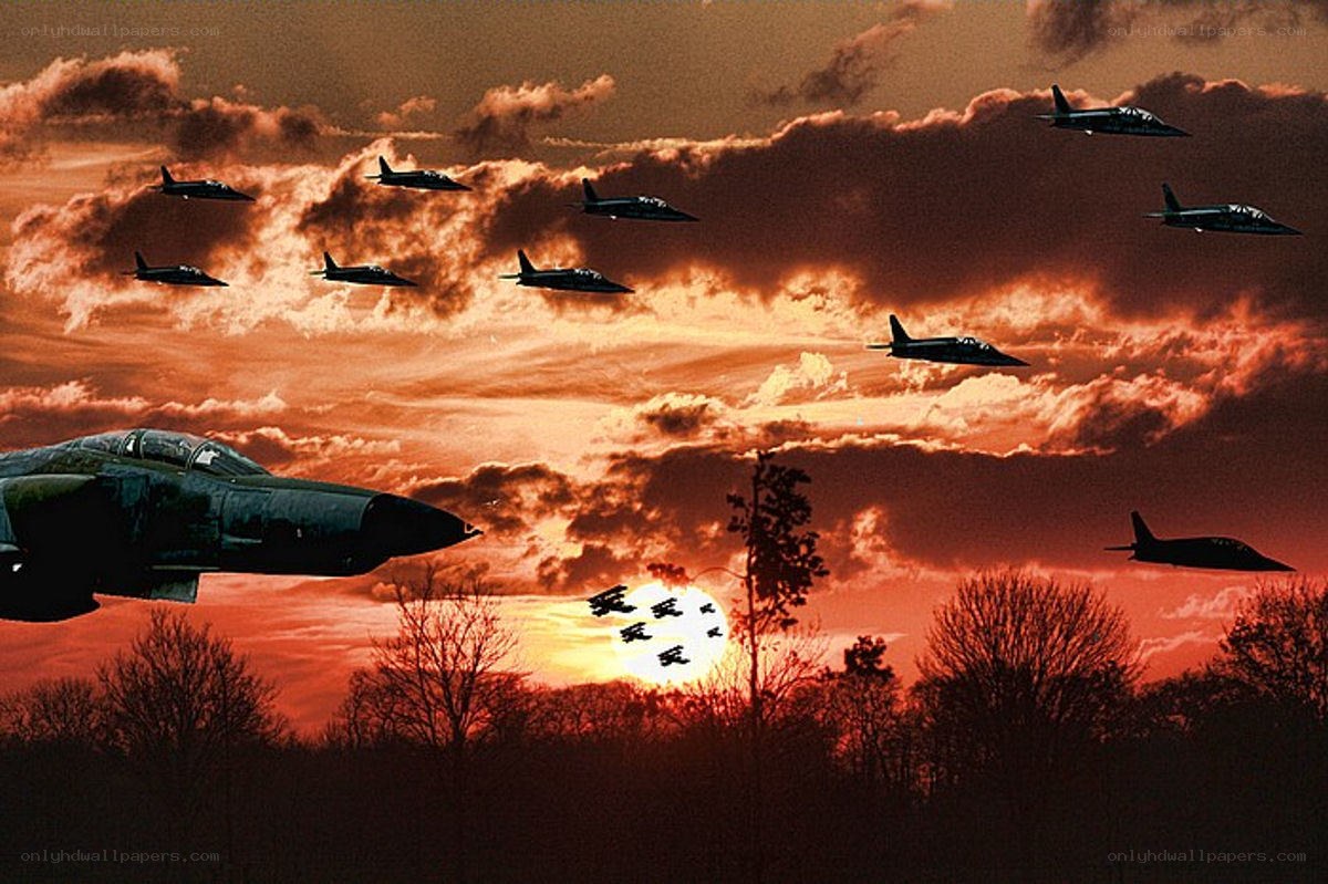 Jet fighters at sunset