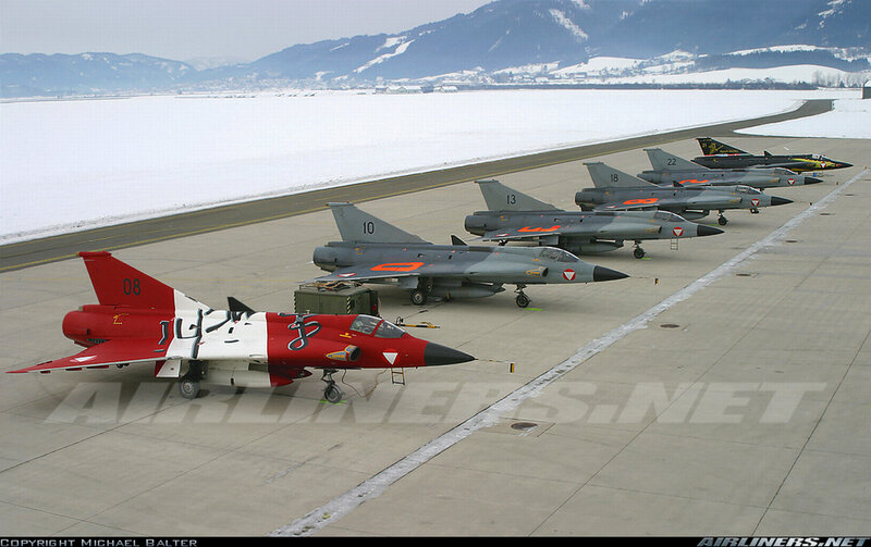 Jet fighters on snowy tarmac