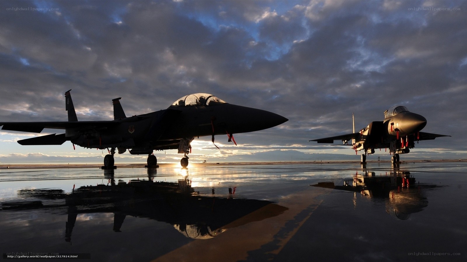 Jet fighters on wet tarmac