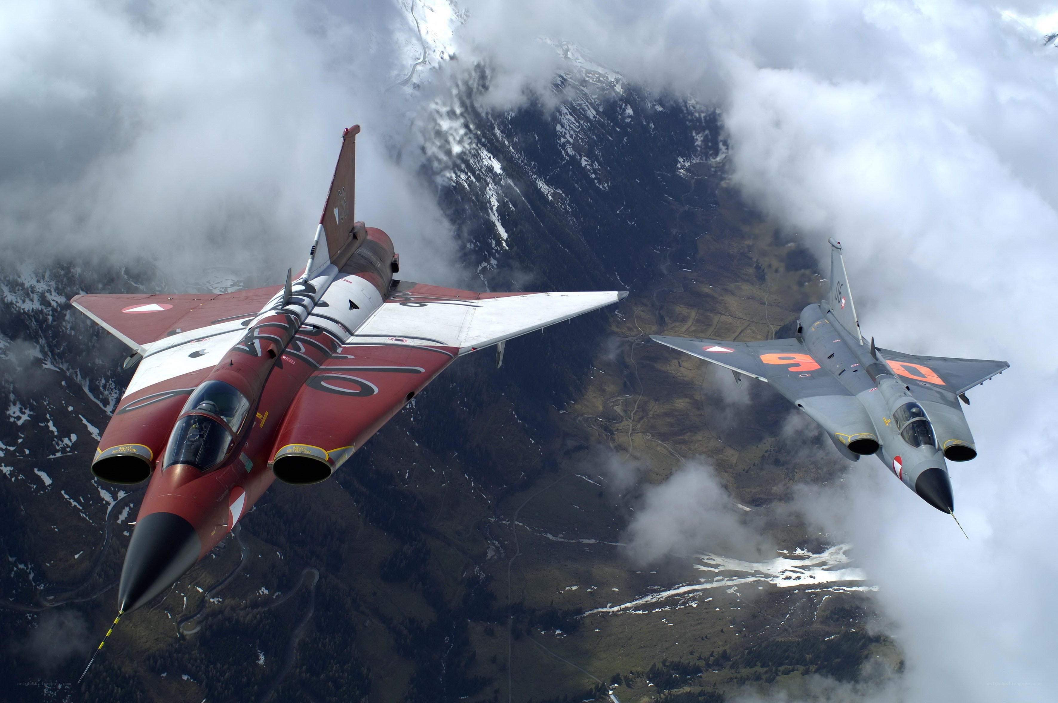 Jet fighters over mountainous terrain