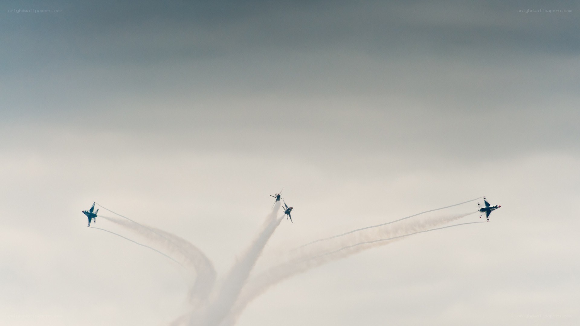 Jet fighters performing aerial display