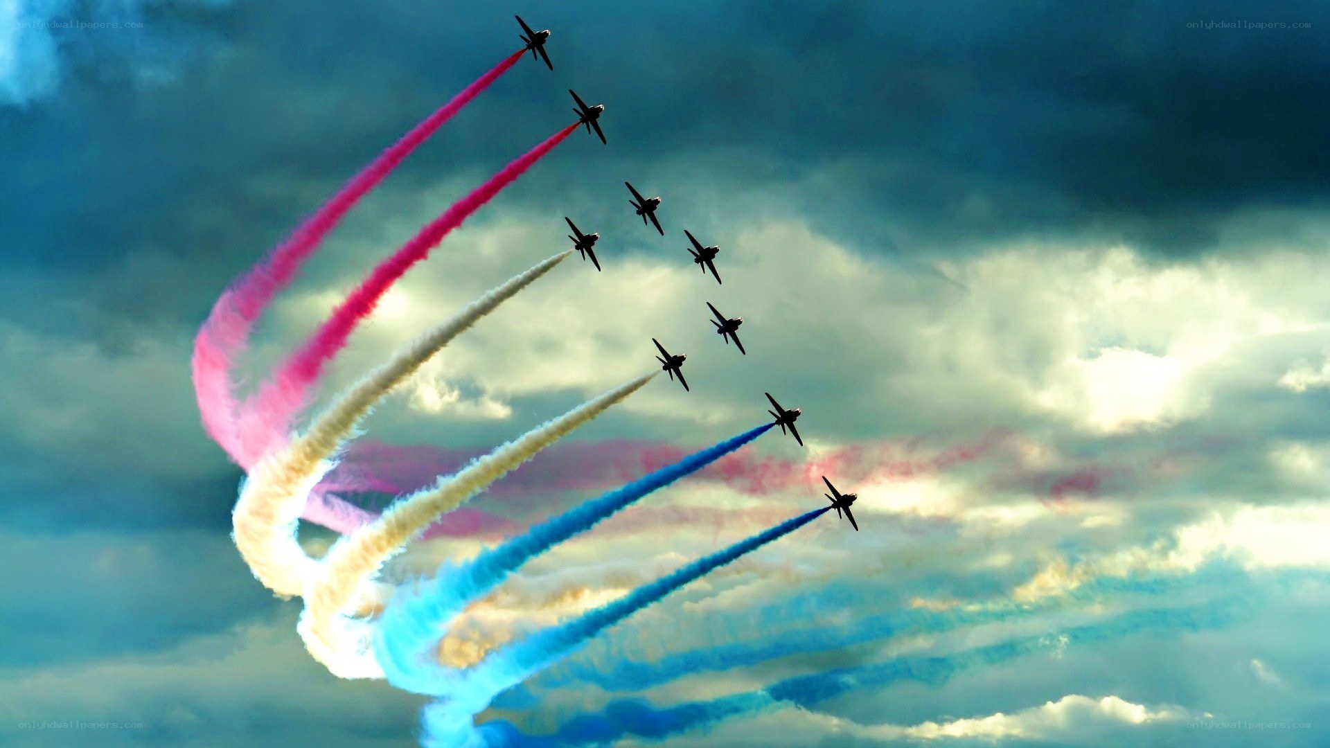 Jet fighters performing aerial display