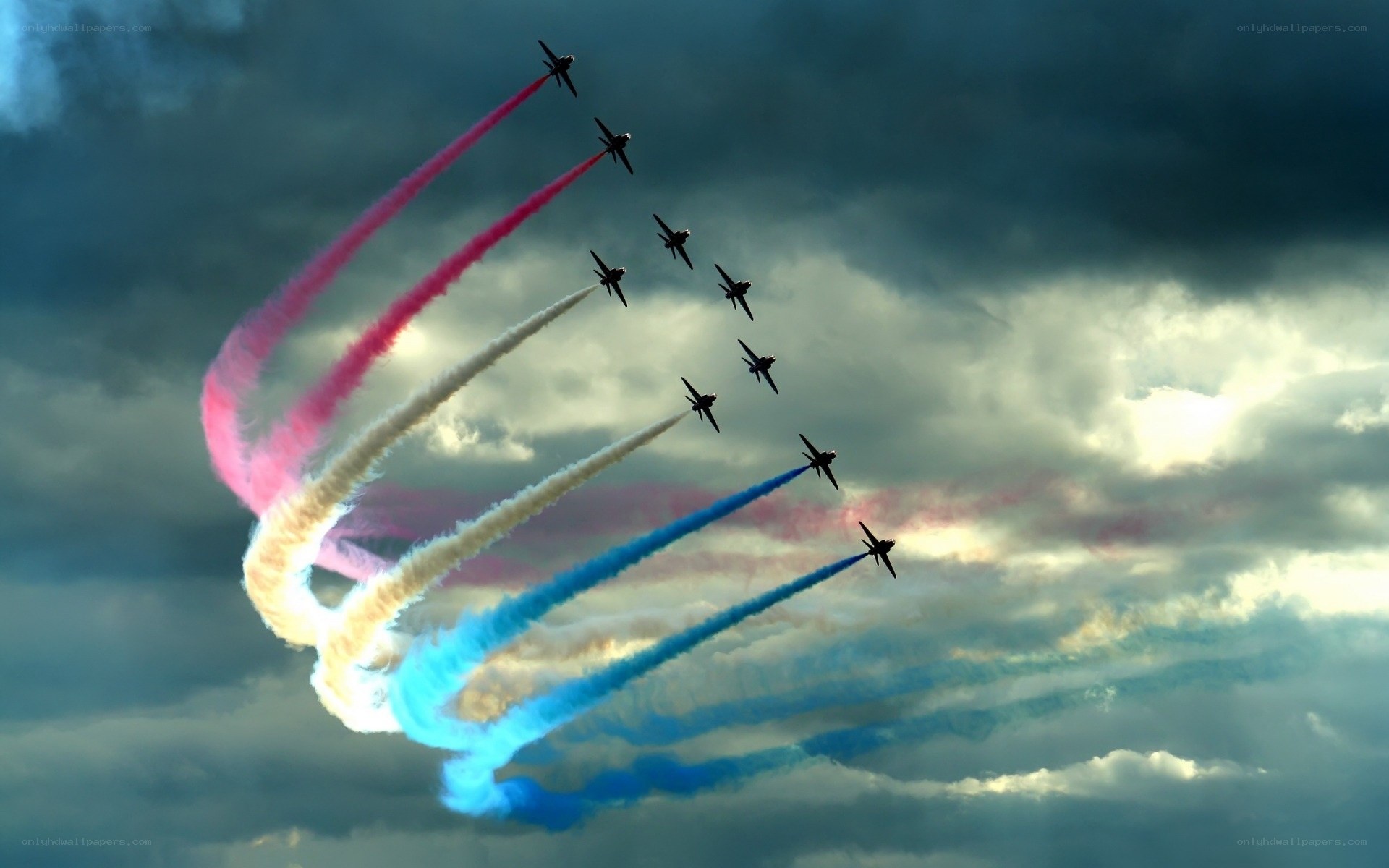 Jet fighters performing aerial display