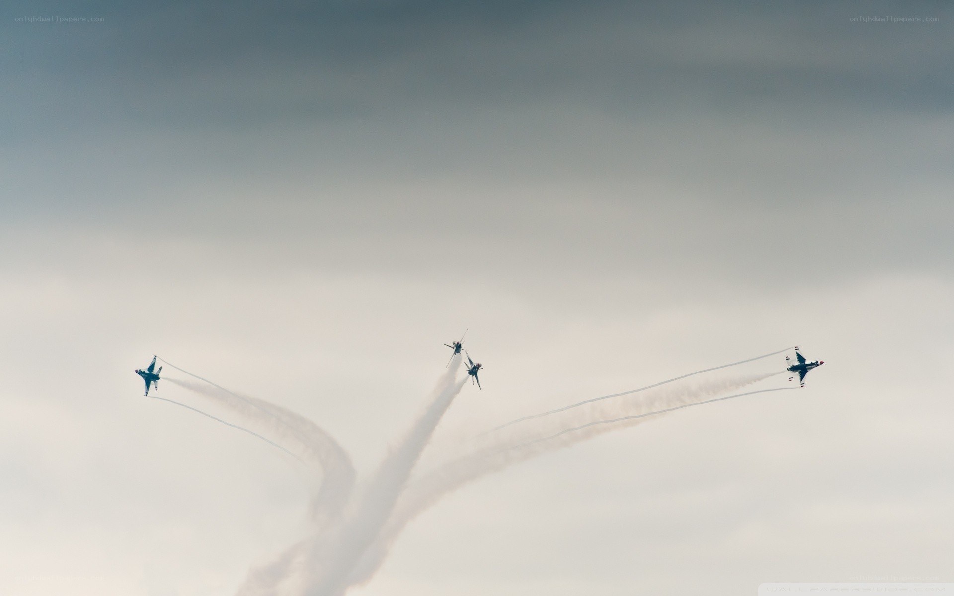 Jet fighters performing aerobatics