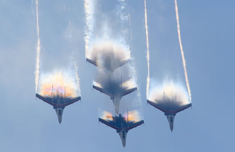 Jet fighters performing aerobatics