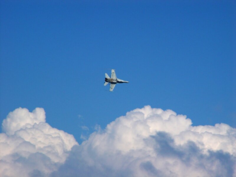 Jet flying above clouds
