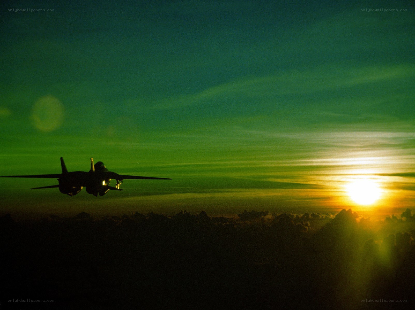 Jet flying at sunset