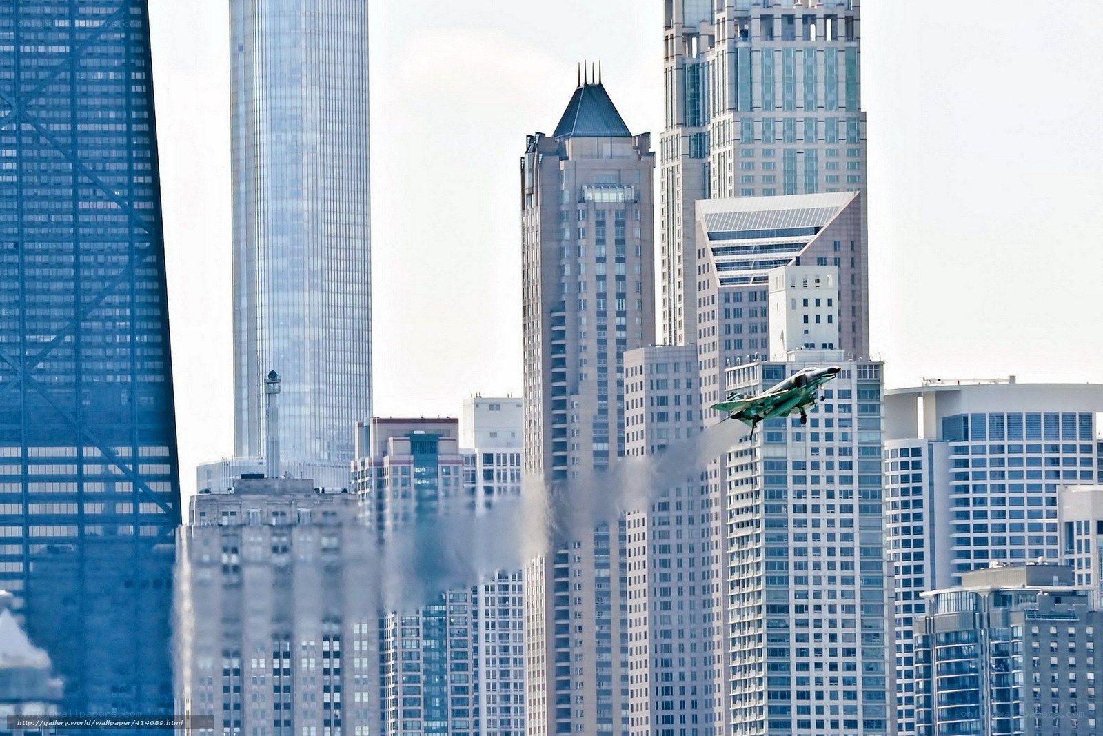 Jet flying over city skyline