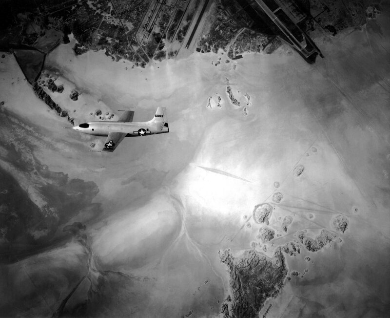 Jet flying over desert