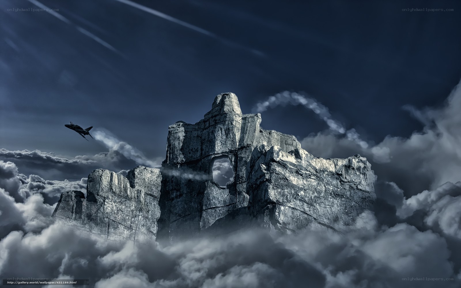 Jet flying over mountain peak