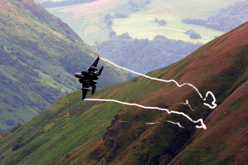 Jet Flying over Mountains — Green