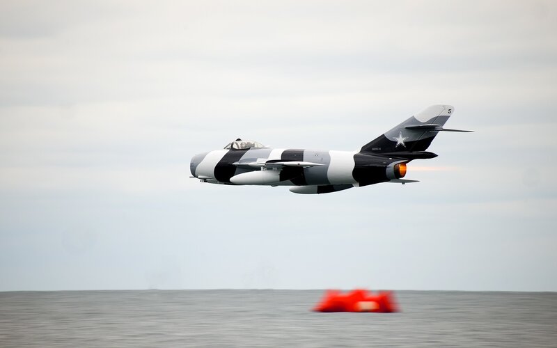 Jet flying over the ocean