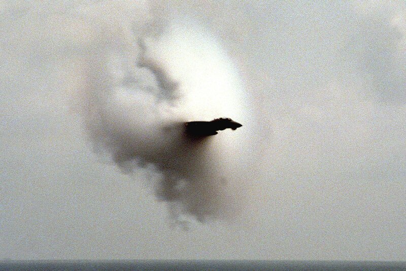 Jet flying through cloud