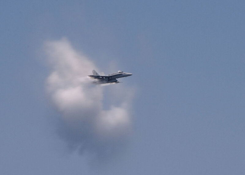 jet flying through cloud