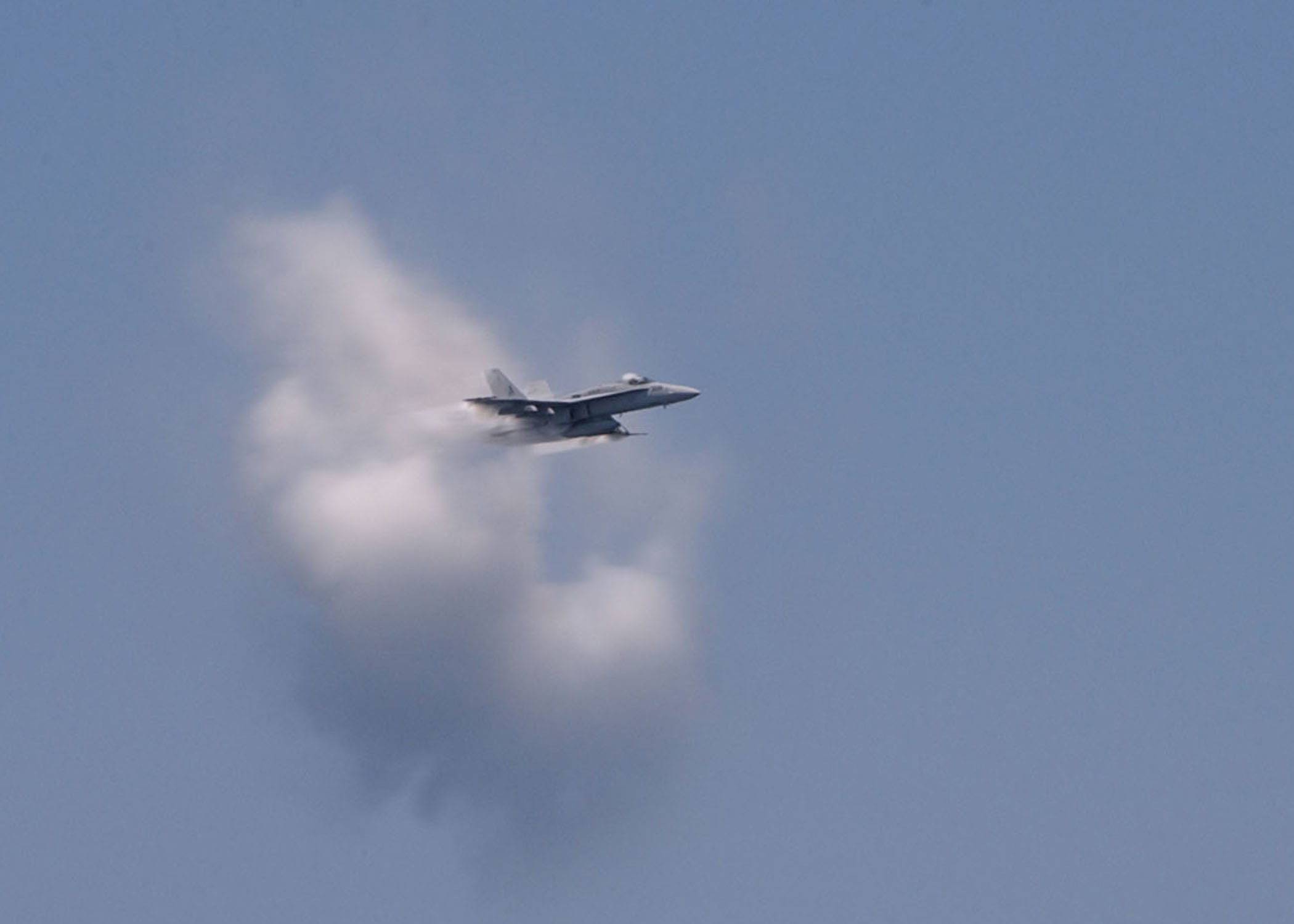 jet flying through cloud