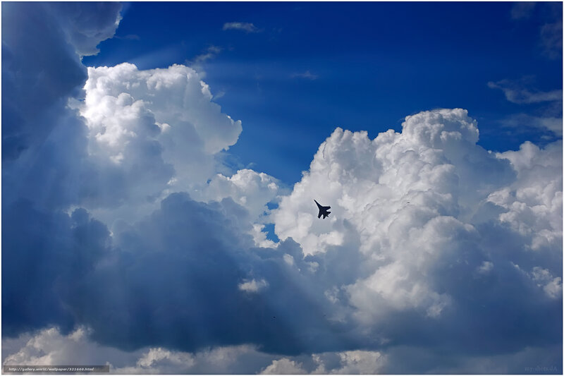 Jet flying through clouds