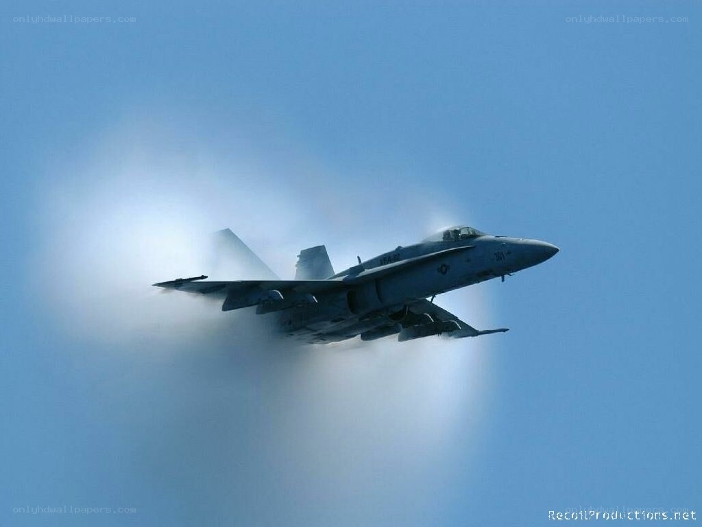 jet flying through vapor cone