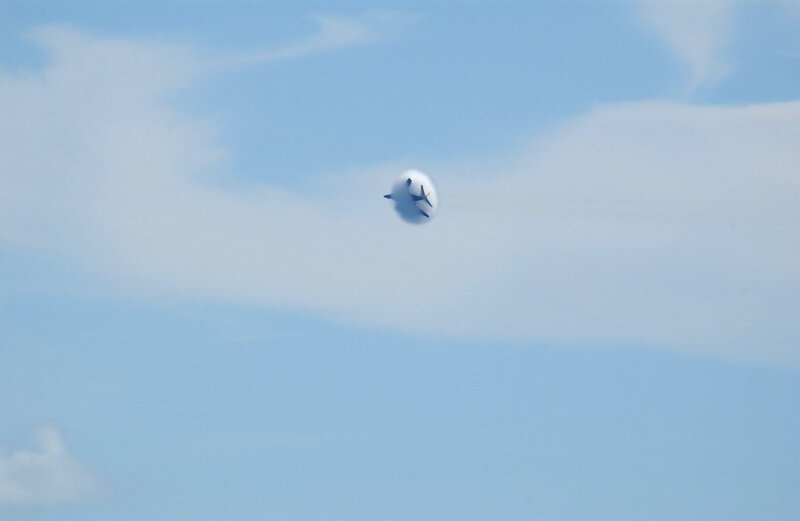 Jet flying through vapor cone