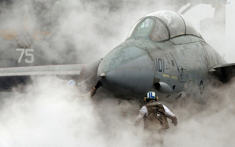 Jet on aircraft carrier deck