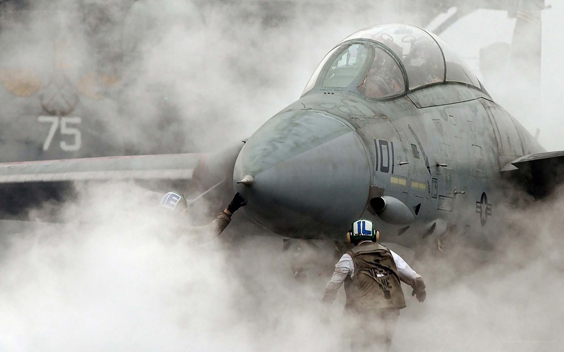 Jet on aircraft carrier deck