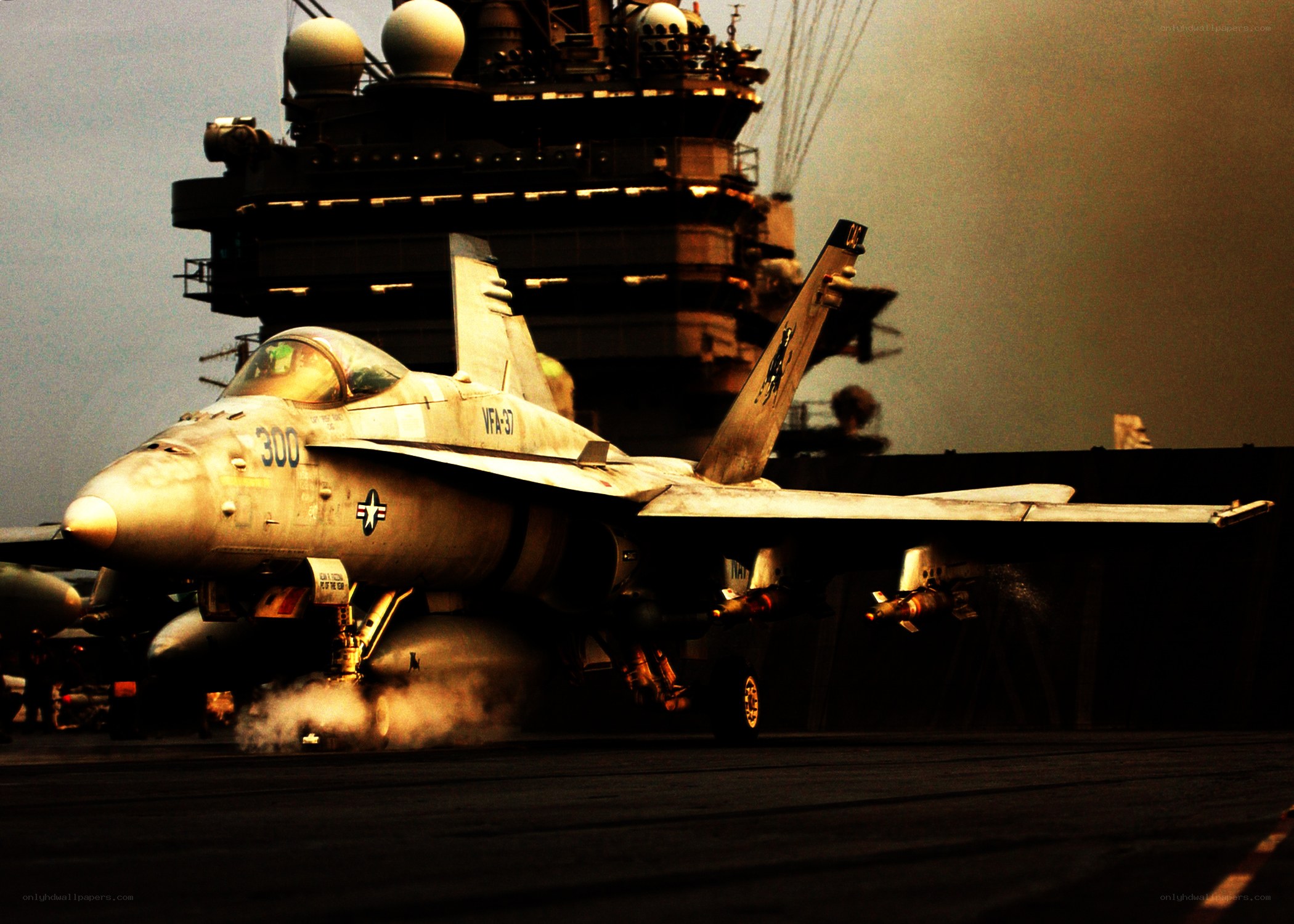 Jet on aircraft carrier deck