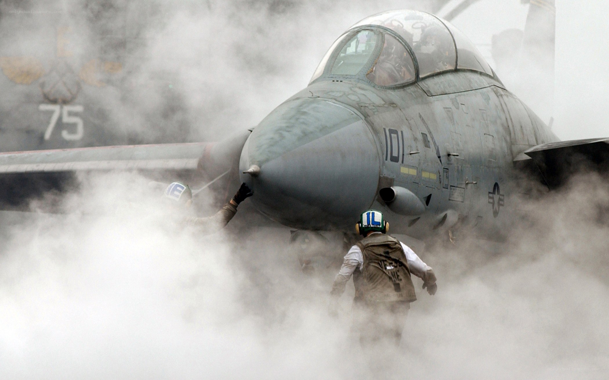 Jet on aircraft carrier deck