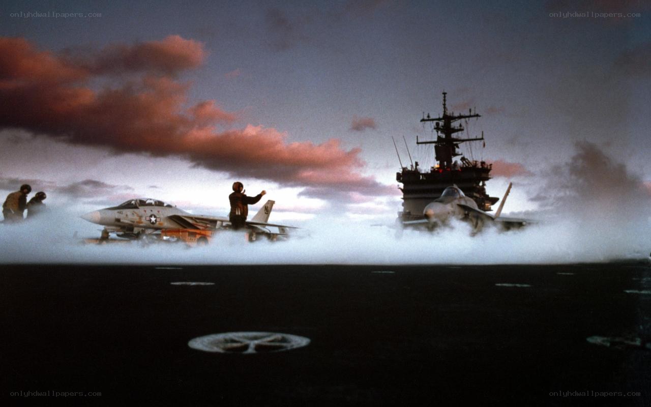 Jet on aircraft carrier deck