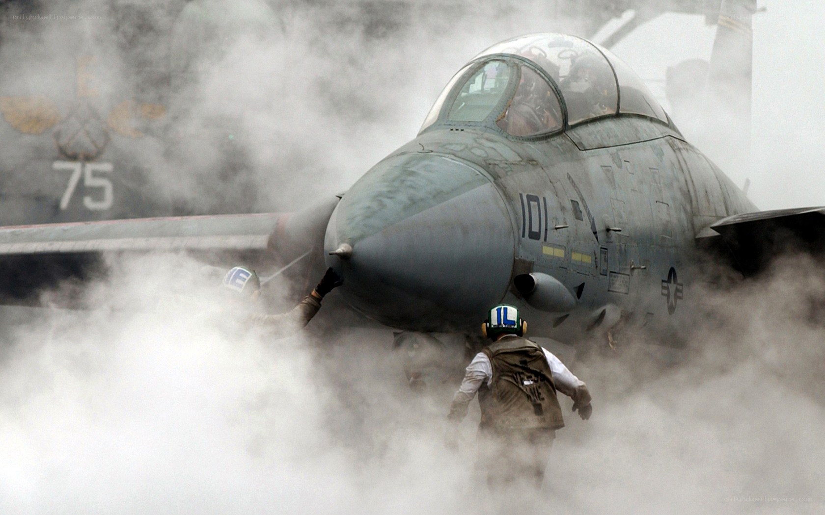Jet on aircraft carrier deck