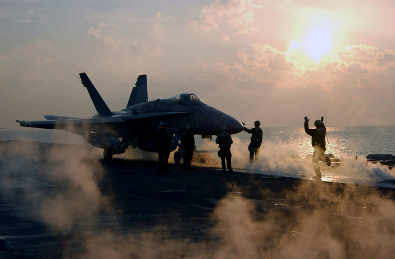 Jet on aircraft carrier deck
