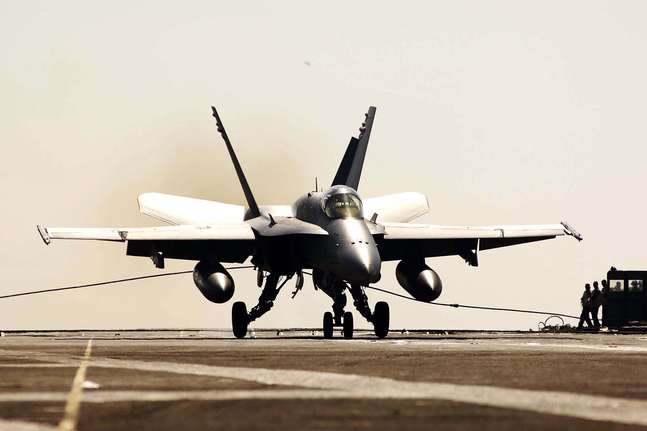 Jet on aircraft carrier deck