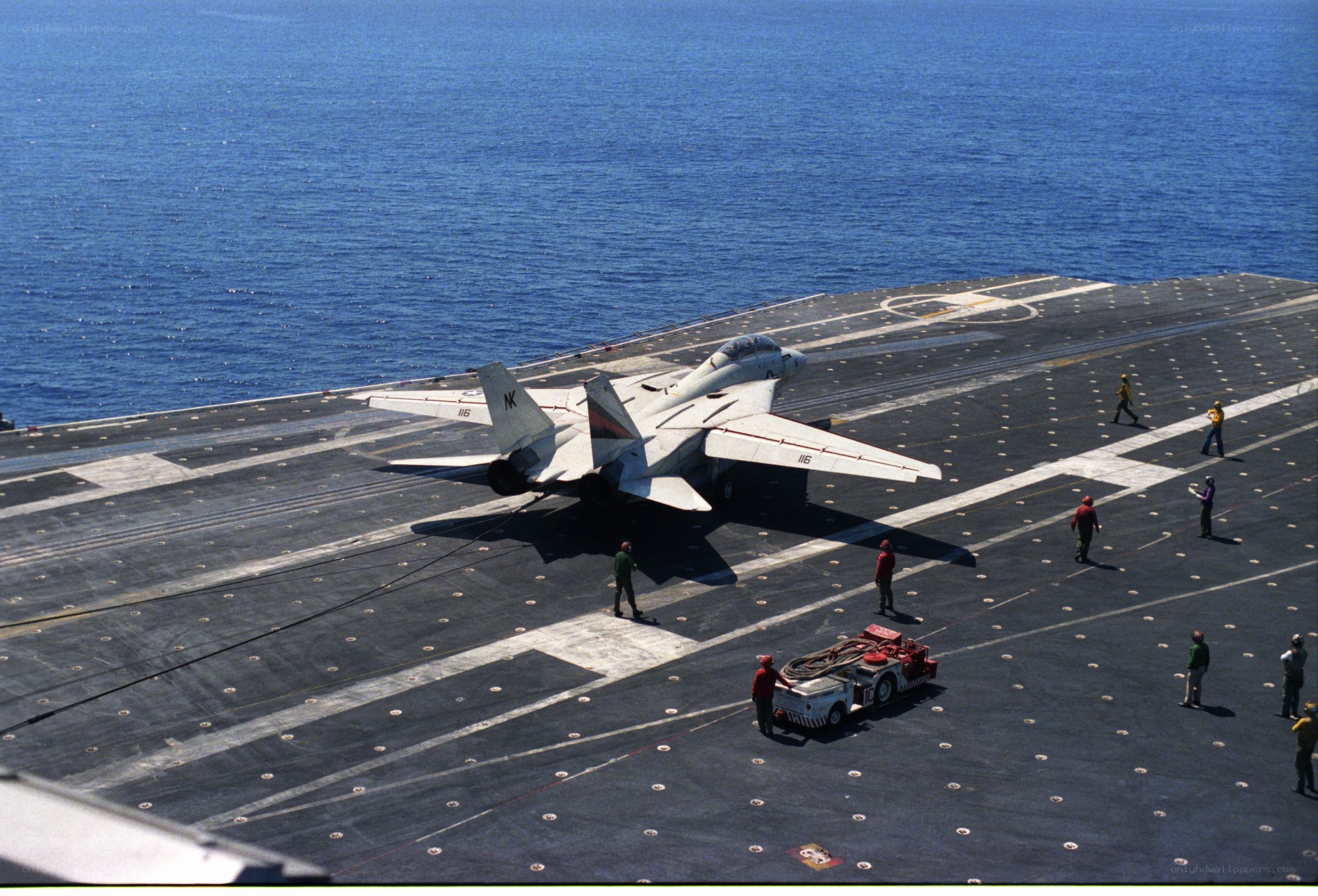 Jet on aircraft carrier deck