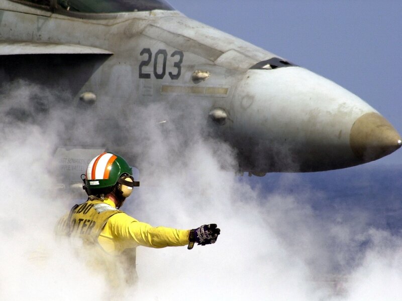 Jet on aircraft carrier deck