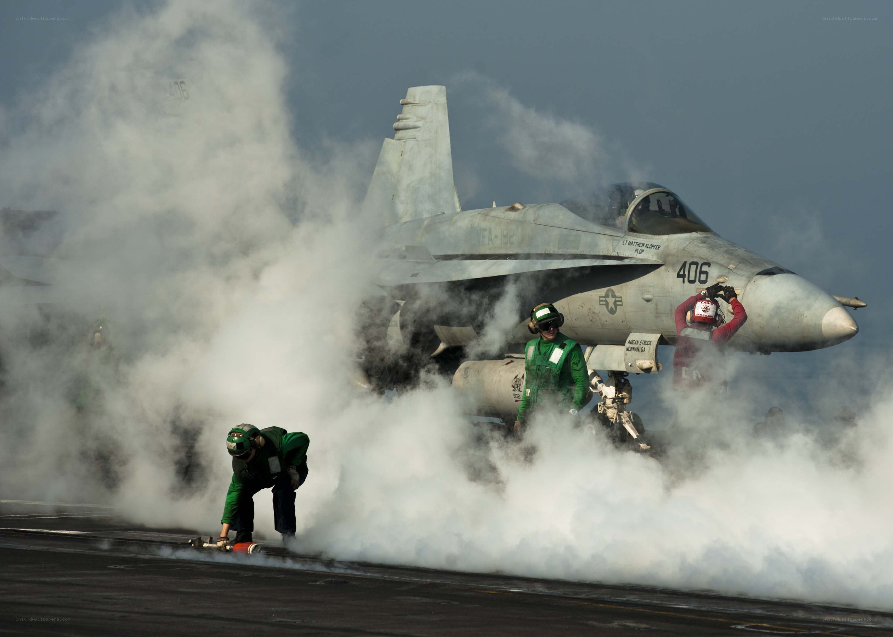 Jet on aircraft carrier deck