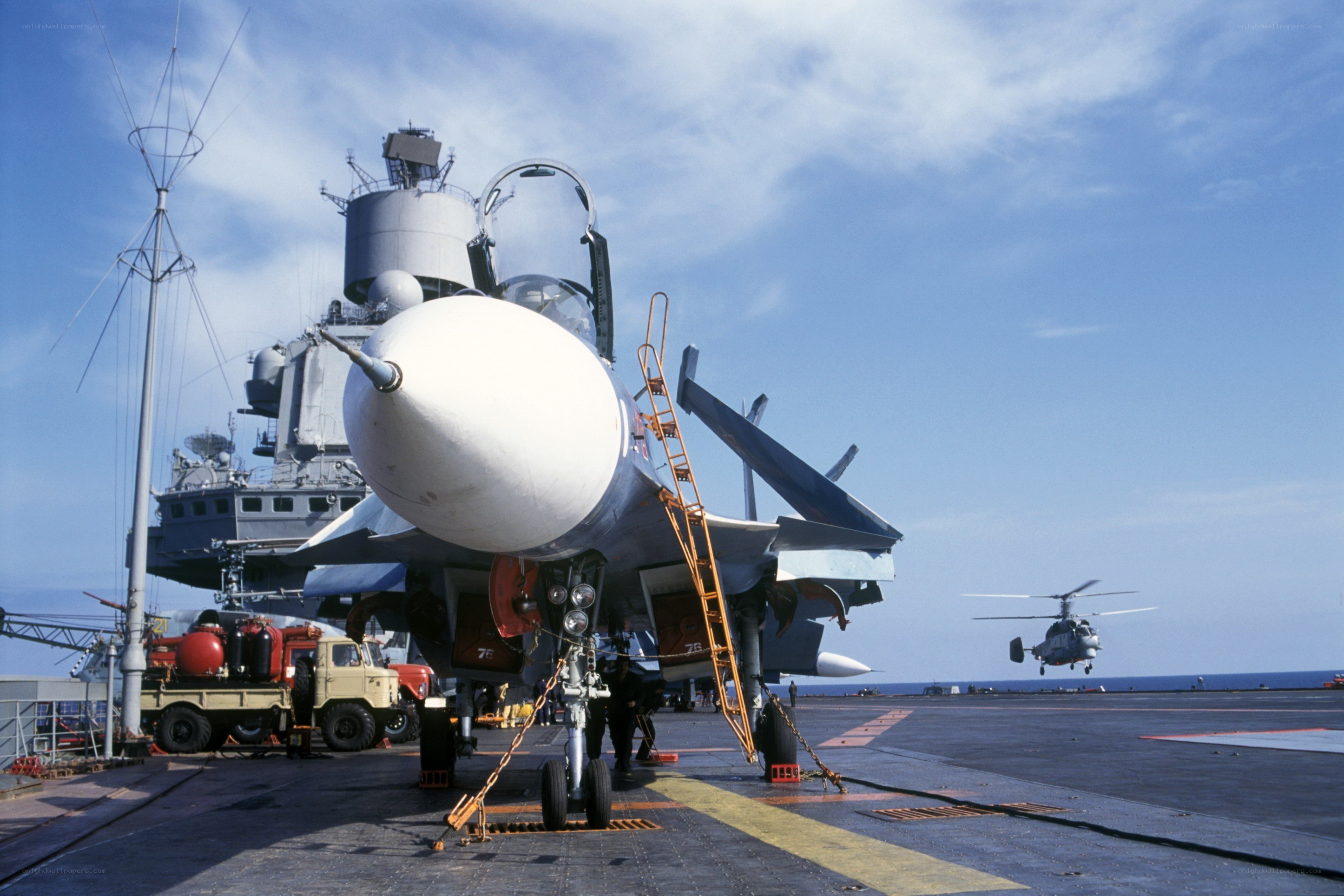 Jet on aircraft carrier deck