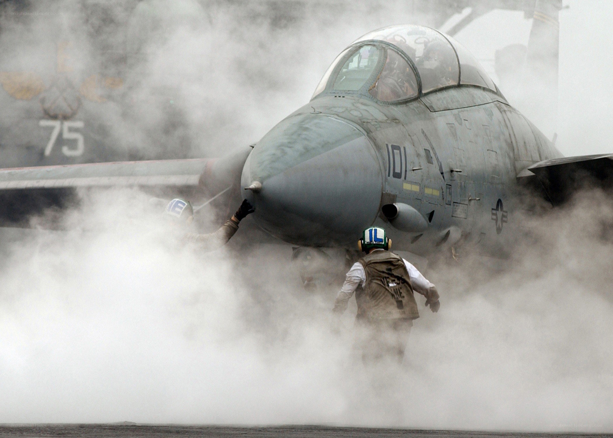 Jet on aircraft carrier deck