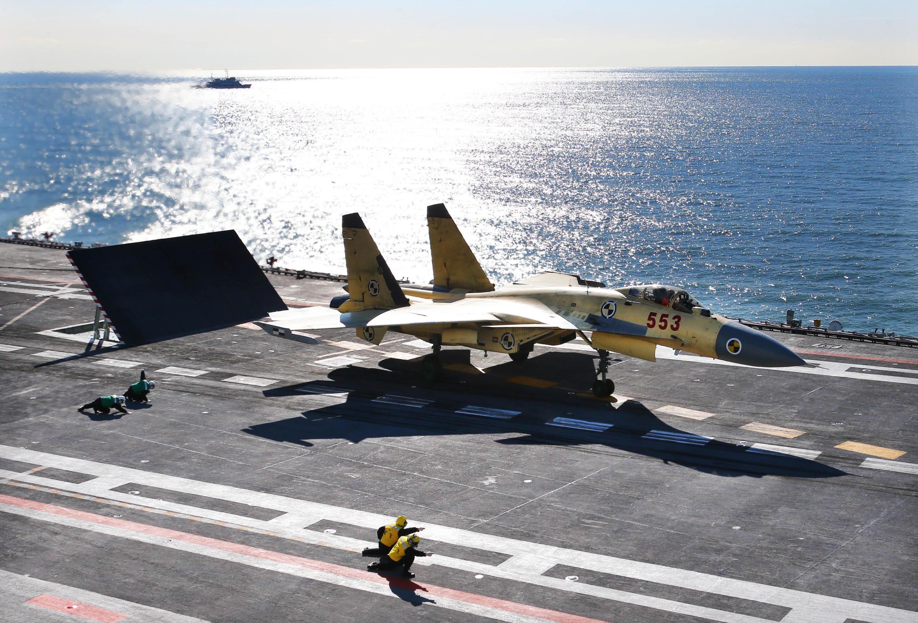 Jet on aircraft carrier deck