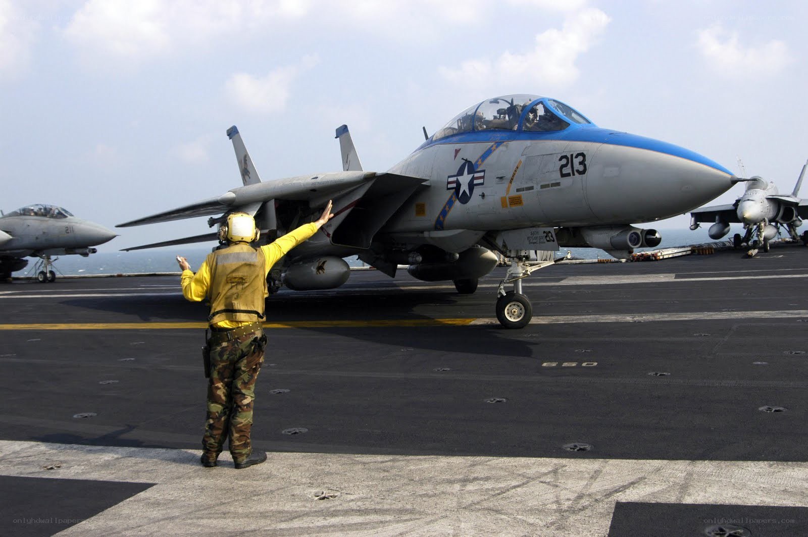 Jet on aircraft carrier deck