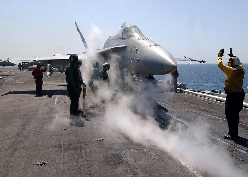 Jet on aircraft carrier deck