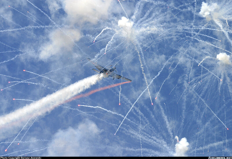 Jet performing aerial display