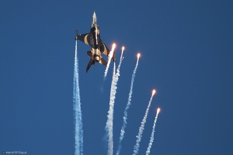 Jet performing aerial display